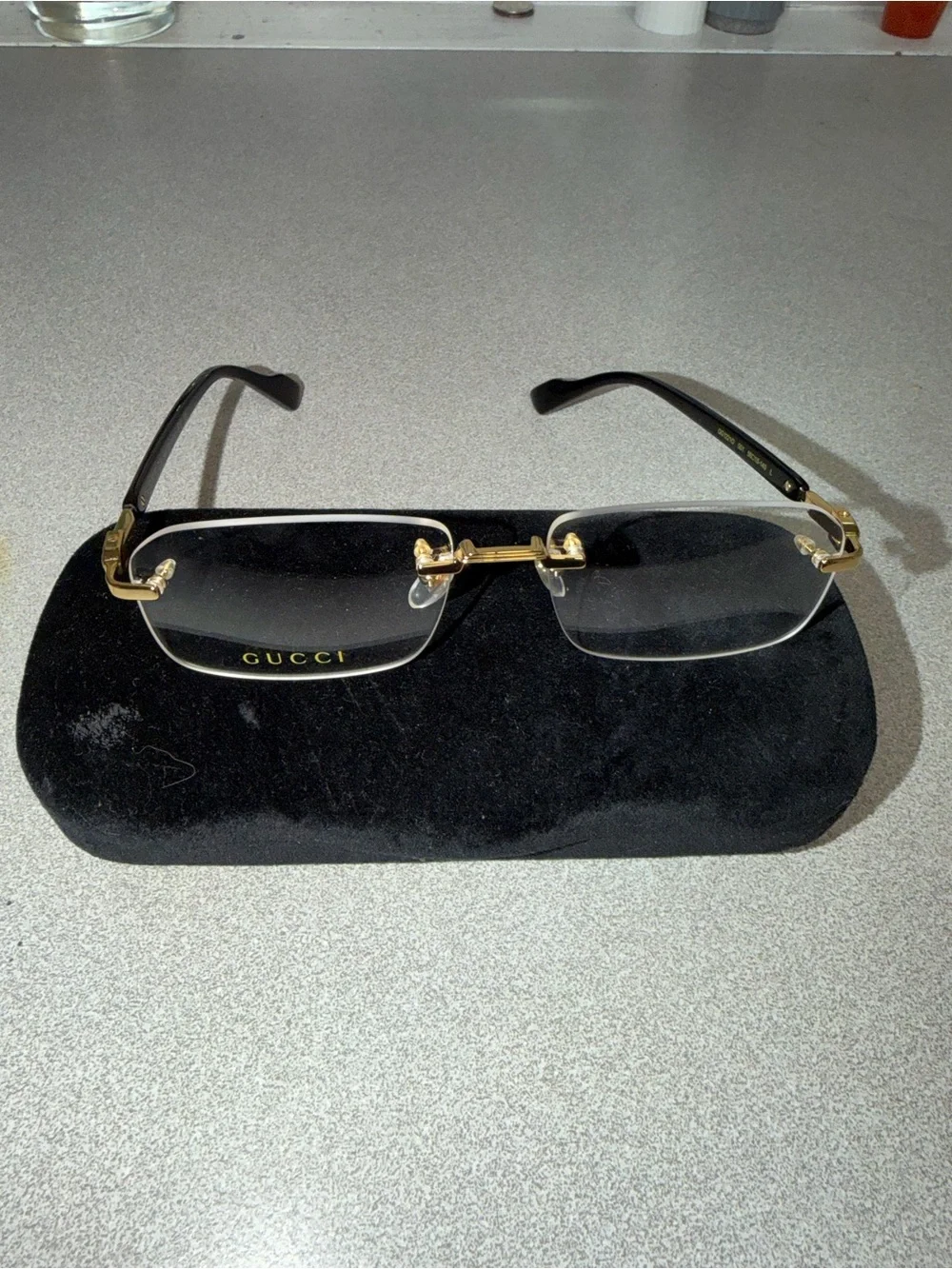 Gucci Men’s Rimless Eyeglasses Gold and Black Accents